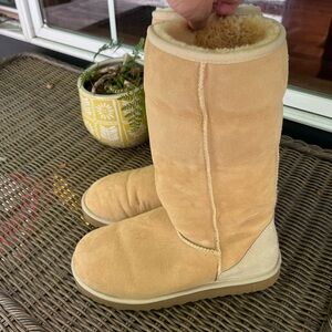 Ugg Tall Boots. Size 10. Like new. Worn an around the house. Sand Color.